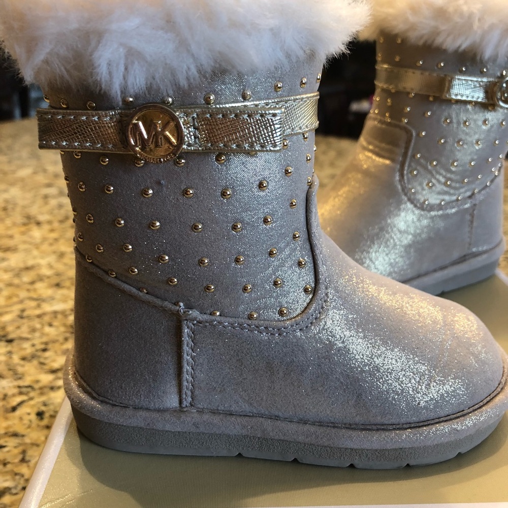 Michael Kors  Toddler’s size 6 gold boots.